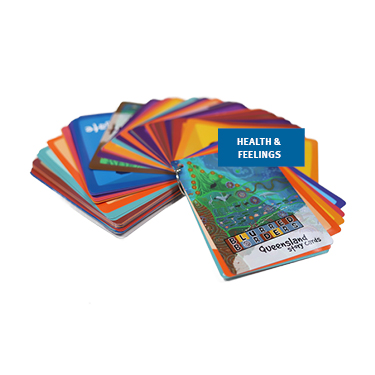 A stack of Blurred Borders story cards fanned out on display.