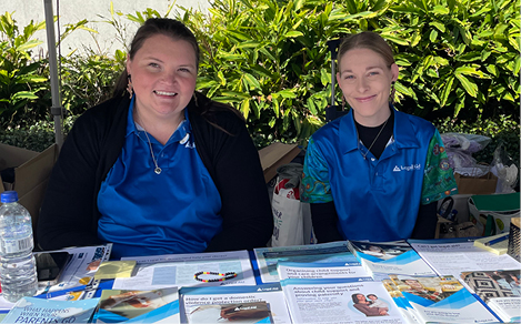 Two Legal Aid Queensland staff at an information stall